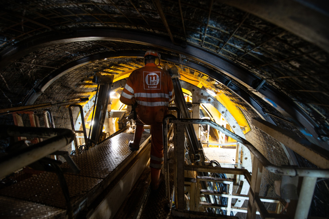 On the tunnel boring machine – the rock is secured with steel nets